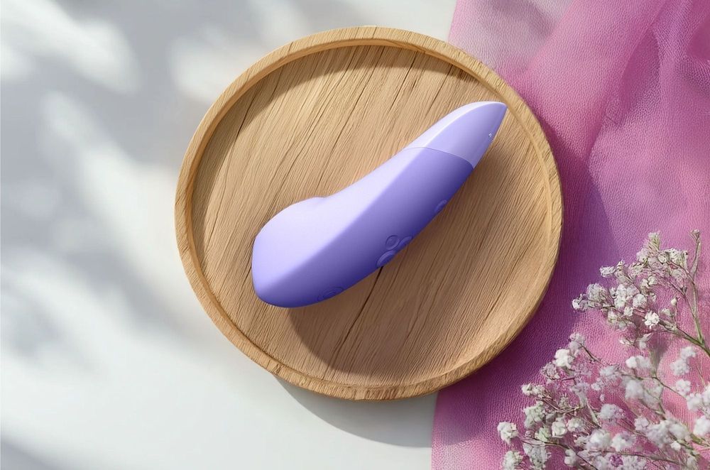 Клиторальный вакуумный стимулятор 2 в 1 Womanizer Enhance с вибрацией, сиреневый