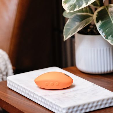 Клиторальный вибратор We-Vibe Temp Tangerine с функцией нагрева и охлаждения, оранжевый